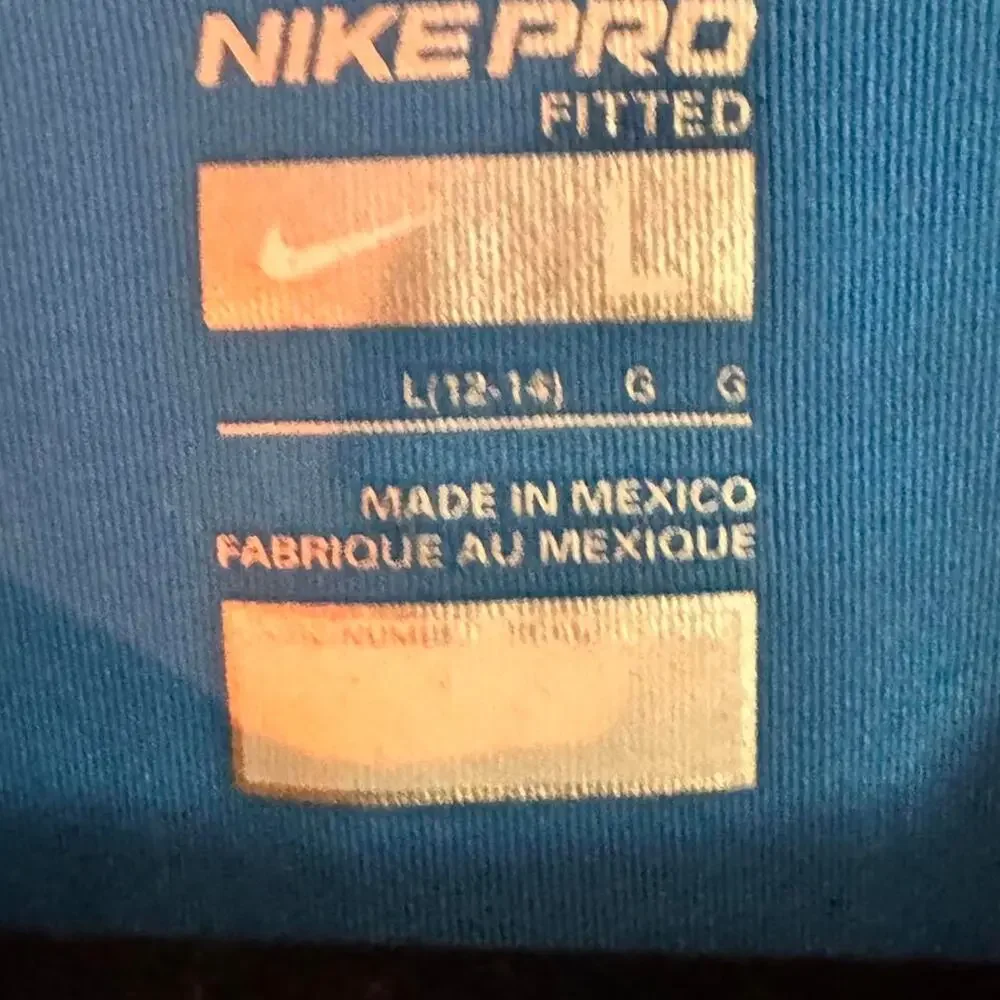 Nike pro blue v neck t shirt